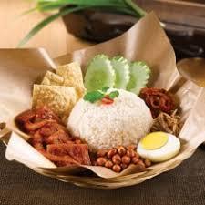 LOCAL DELIGHTS NASI LEMAK "KAMPUNG BARU" Rice cooked in Coconut milk, Cuttlefish sambal, a boiled egg, Anchovies,