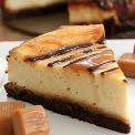 Brownie Caramel Cheesecake Serves: 4 Prep time: 30 minutes Cook time: 55 minutes ½ (8 ounce) Jiffy Brownie Mix 2 eggs ½ Tablespoon cold water ½ (14 ounce) package individually wrapped caramels ½ (5