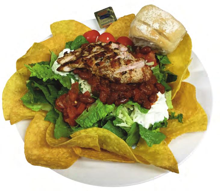 Signature Salads Chicken Taco Salad - Mixed greens surrounded by tortilla chips topped with