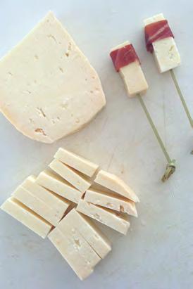 Funnel into a plastic squeeze bottle. Refrigerate if not using right away. Cut brick of halloumi through the center, then each half into 1/4-inch thick strips, then cut those in half.