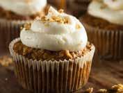 Carrot and Banana Pup Cakes Ingredients Cupcakes 2 cups water 1 cup unsweetened applesauce 2 carrots, grated 1 egg 2 ripe bananas, mashed 4 cups whole wheat flour 1 teaspoon baking powder Directions