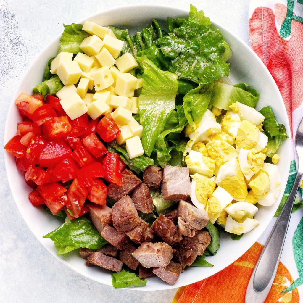 Cobb Salad with Ham Active Time: 20m Total Time: 20m 6 eggs 3 tablespoons red wine vinegar 2 tablespoons extra virgin olive oil 1 teaspoon Dijon mustard 1 head romaine lettuce 2 cups cooked ham 1