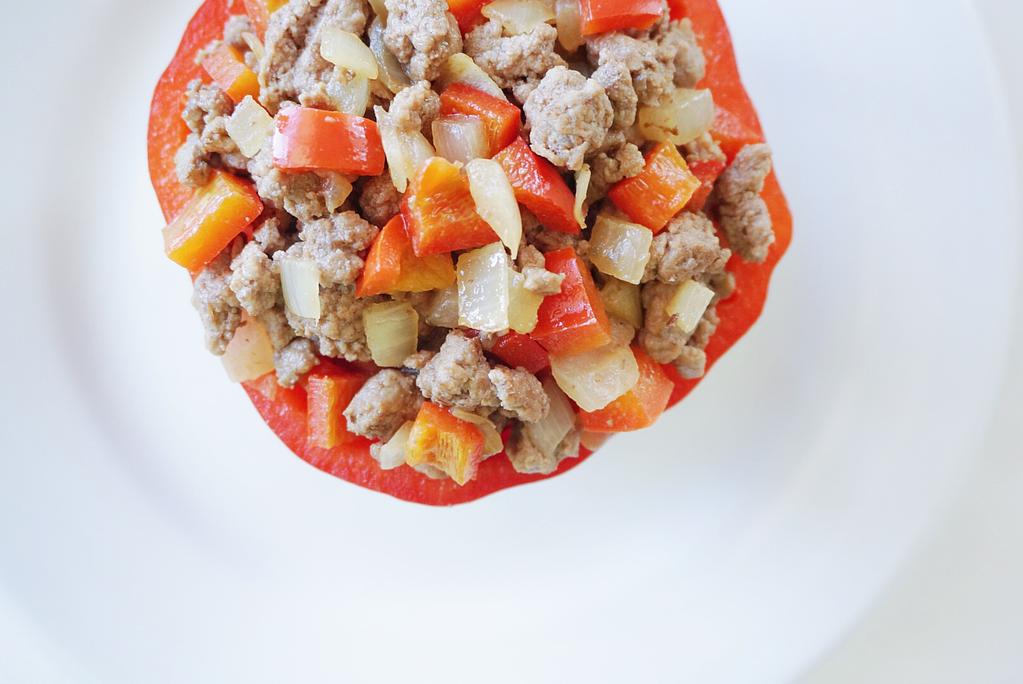 Beef Stuffed Peppers (makes enough for Day 5 and Day 6) Ingredients 2 teaspoon coconut oil 1/2 cup diced onion 1 cup grass fed ground beef 1/2 cup diced red pepper 2 whole red pepper Salt to taste