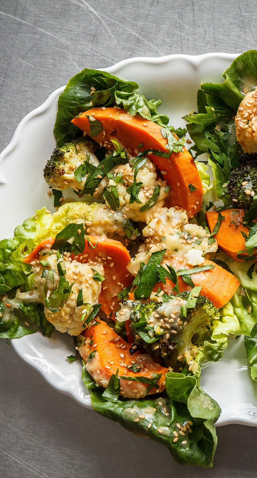 Roasted cauliflower, broccoli and sweet potato with a white miso dressing Cauliflower and broccoli slightly charred with a hint of ginger marries well with the sweet potato and white miso dressing,