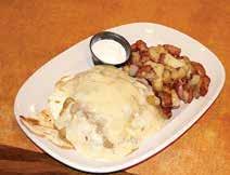 29 We start with a toasted wolferman english muffin, then add fresh spinach, sliced tomato, crisp bacon, and finish it with poached eggs and creamy Hollandaise sauce. SOUTHERN BENEDICT...$10.