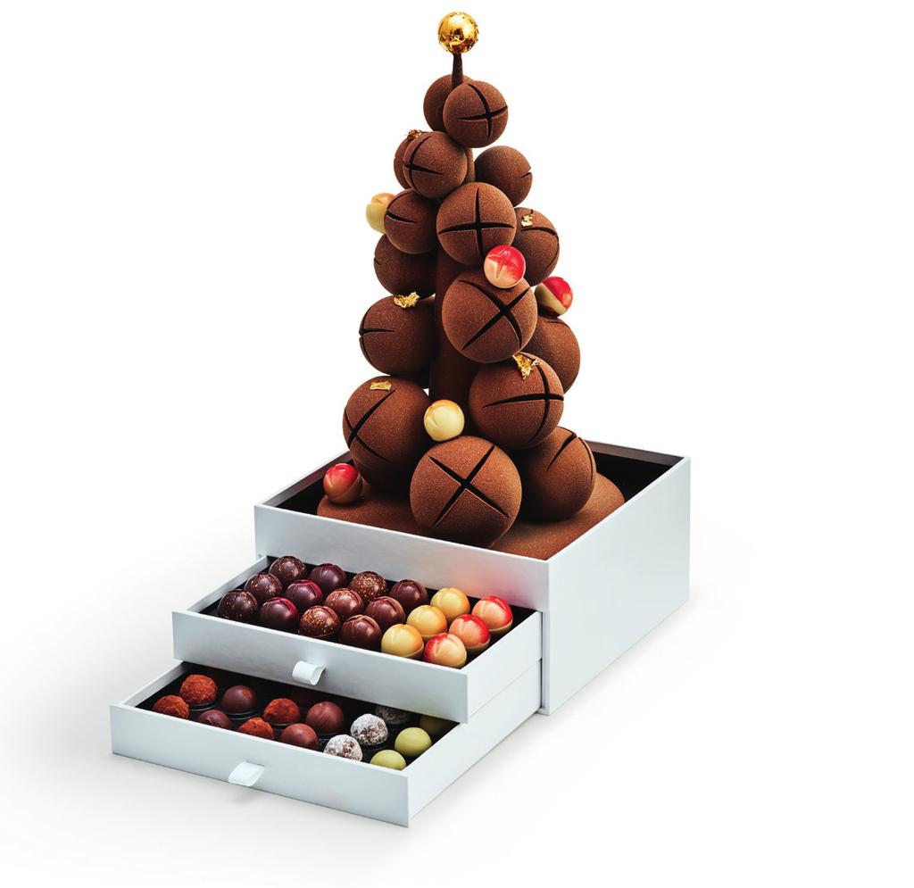 Irresistible Bells the christmas tree Ever the centrepiece of a Maison Pierre Marcolini Christmas, this year s magical tree comes bedecked with dark chocolate and praline bells.