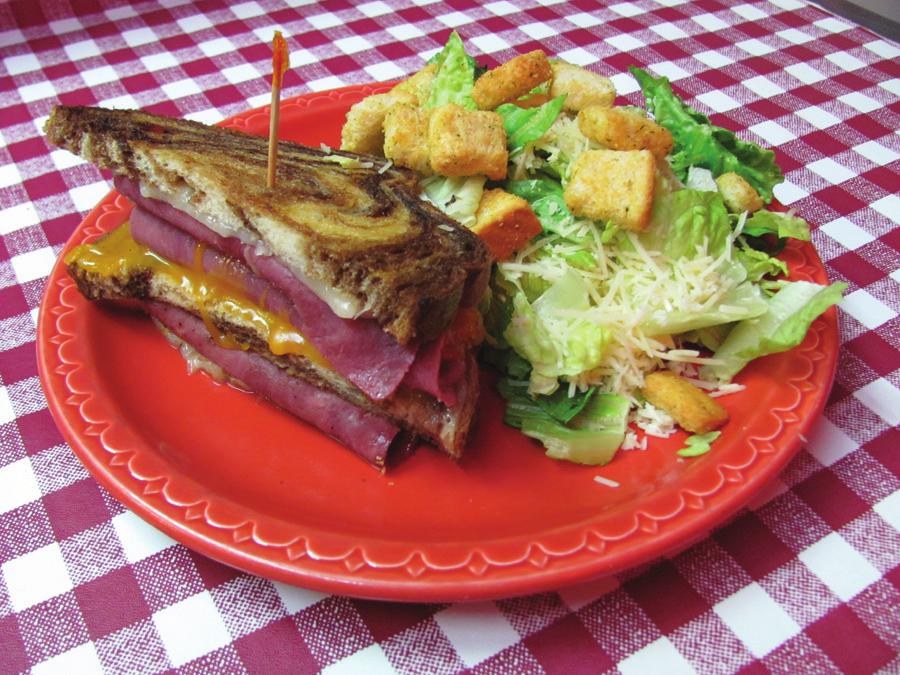 Sandwich Selections!Toasted Ham & Cheese Bacon Griller! Smoked hickory sliced ham, cheddar cheese & apple smoked bacon on toasted sour dough bread, lettuce, tomato & pickles and sweet mayo sauce!