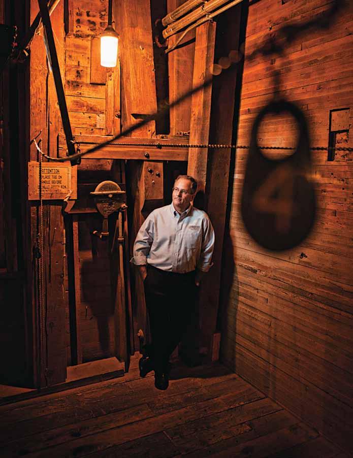Gordon Lane, president of Briess Malt & Ingredients, stands in the company s historic malt house in downtown Chilton.
