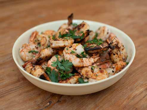 Chilli lime prawns P 1 kg prawns 5 garlic cloves, crushed* 2 tbs chilli flakes** 2 limes, zested & juiced 2 tbs olive oil* to taste parsley **chilli flakes are hot!