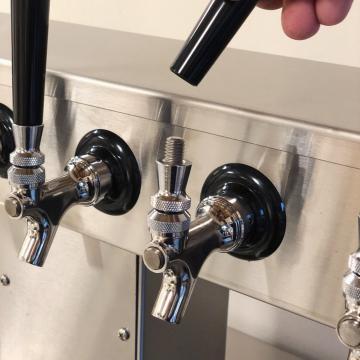 the taps onto which controls are installed. An advanced tilt sensor determines when the handle is tipped forward into the open position or back to close the tap.