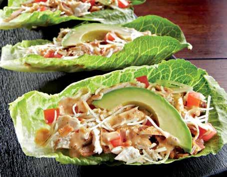 SHAREABLE ANCHO CAESAR GRILLED CHICKEN LETTUCE WRAPS With Parmesan, bacon, avocado, diced tomatoes and Ancho Chile Caesar dressing. 9.49 644 cals.