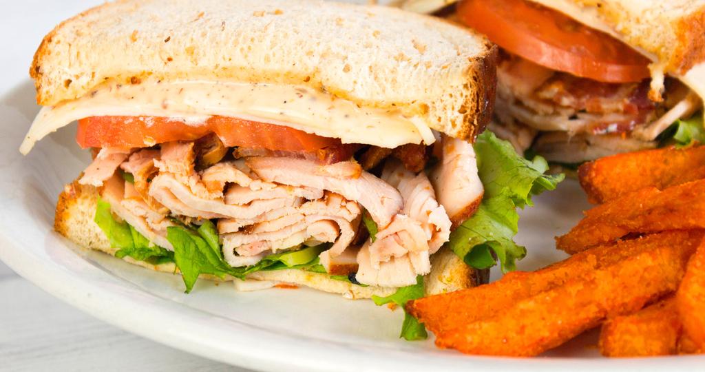 SANDWICHES» All Deli Carved and Sandwich Stack selections are served with french fries. Upgrade to sweet potato fries for 99.