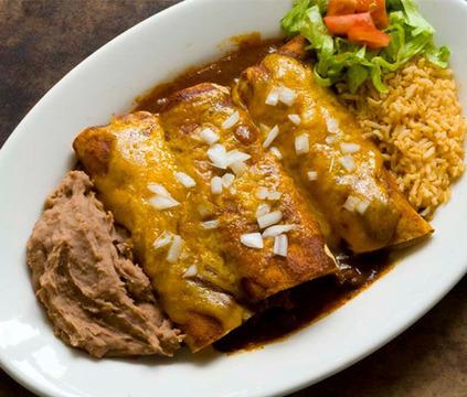 HOUSE SPECIALTIES (E1) DELUXE MEXICAN PLATE (E11) CHIMICHANGA DINNER Two Chicken flautas, mini-chimichangas, beef taco, enchilada, tamale, rice and beans $999 Large flour tortilla filled with chicken