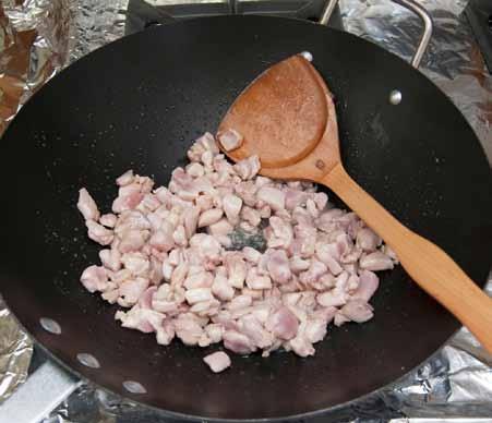 3 3 Add the cubed chicken meat and cook over medium-high heat only until the chicken is cooked all the way through.