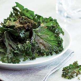 Crispy Kale Chips 1 large bunch of kale, tough stems removed, leaves torn into pieces (about 16 cups) 1 Tbsp extra-virgin olive oil 1/4 tsp salt 1) Position oven racks in upper third and center of