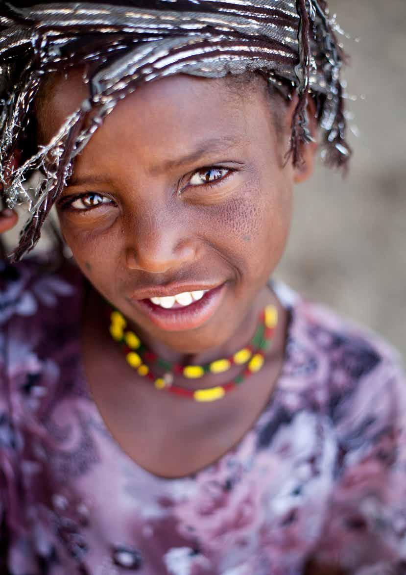 Ethiopia I met this little girl near the sulfurous wells of Lake Shala.