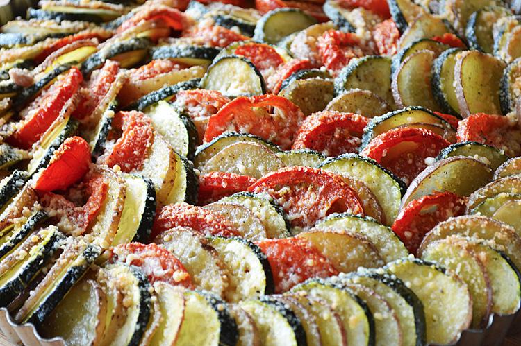 Zucchini, Potato & Tomato Casserole Toss potatoes, zucchini and tomato slices with salt & pepper. Arrange in a single layer over the onions, alternately and overlapping slightly.
