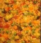 Zesty Veggie Paella 2 tablespoons olive oil 1 1/2 cups chopped onions 1 red pepper, chopped 2 teaspoons chopped garlic 1 cup instant brown rice 1 (15 ounce) cans stewed tomatoes 1 (15 ounce) cans