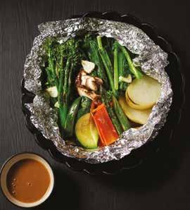 bed of garden salad, served with a mild soy sauce based dressing FOIL BAKED VEGETABLES 18 Green