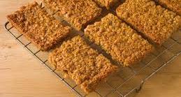+ Flapjacks Preheat the oven to 180 C/Gas 4 Butter a 28 x 18 cm Swiss roll tin and line the base with baking parchment.