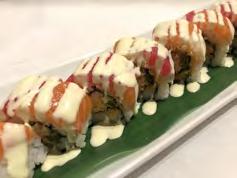 95 Crab, avocado, and cucumber inside, topped with spicy tuna,