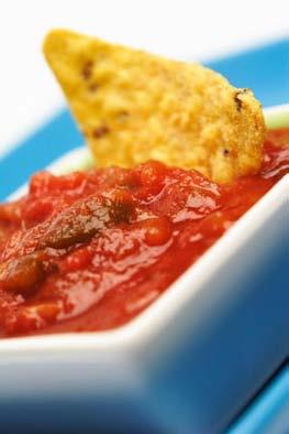 low-fat cheddar cheese 2 small tomatoes 1- Preheat oven to 400 F. 2- Spray dish with vegetable oil spray. 3- Spread bean dip over bottom of dish. 4- Rinse and slice green portions of onions.