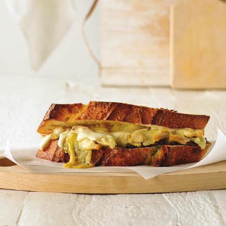 Gruyere, Chicken & Pesto Grilled Sandwich SERVES 1 sandwich 5 6 2 slices good quality sourdough bread, cut into 1cm thick slices Softened butter 1 tablespoon pesto 80g cooked chicken, shredded 40g