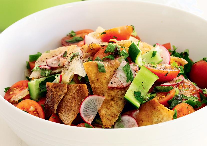 FATTOUSH SALAD Serves: 4 2 small naan breads Sunflower oil ½ tsp sumac 1 heart of Romaine lettuce, chopped 1 zucchini or celery, chopped 5 cherry tomatoes, chopped 5 green onions (both white and