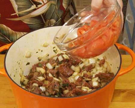 Cover the pot with a lid or aluminum foil and bake in a 275 F (140 C) oven for 3½ hours.
