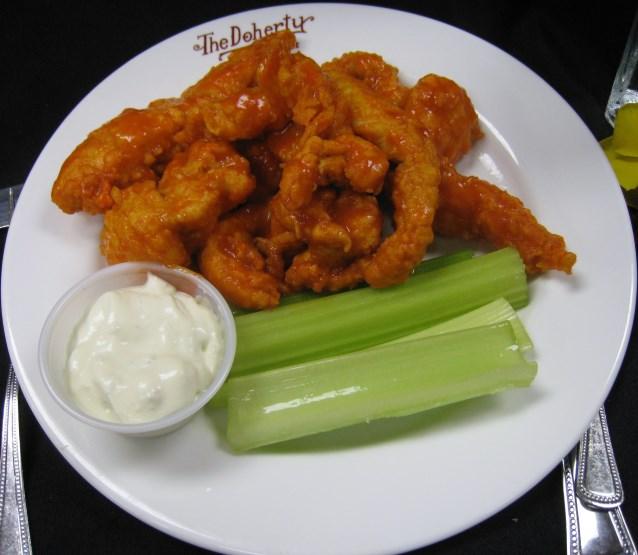 25 Boneless chicken tenders, lightly floured, deep-fried and smothered in a spicy buffalo sauce; served with celery sticks and house-made blue cheese dressing Deep- Fried Mushrooms 6.