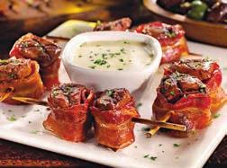 19 Boston s Nachos Bacon Wrapped Steak Skewers* Grilled flat iron steak wrapped in smoked bacon. Served with our bleu cheese cream sauce. 10.