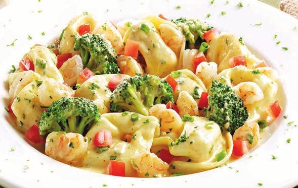 Shrimp Tortelloni Shrimp Tortelloni Cheese tortelloni and sautéed shrimp with broccoli, green onions and tomatoes tossed in garlic butter and