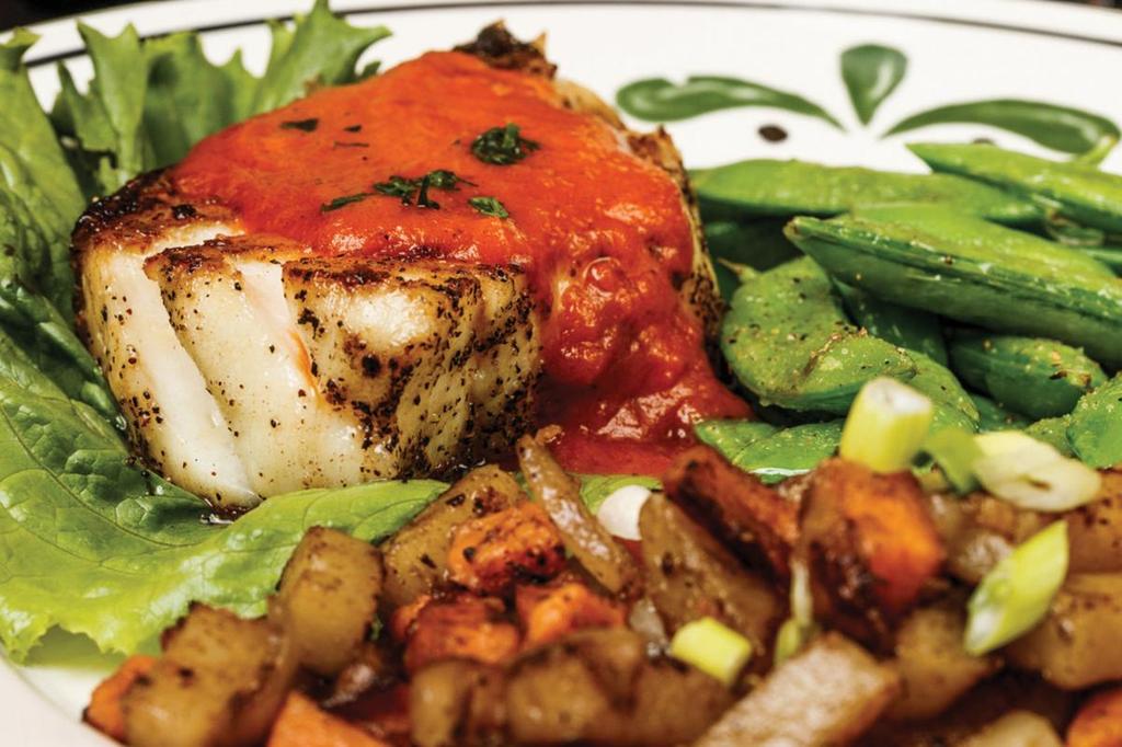 An excellent seafood choice is the grilled Chilean sea bass, which is topped with a sweet roasted red pepper puree.