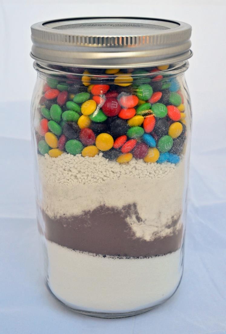 Mocha M & M Brownies You Need: 1 quart Mason or other glass jar 1 cup granulated sugar 1 Tbsp instant coffee powder ½ cup baking cocoa 1 cup all-purpose flour ¼ tsp baking powder 3 Tbsp instant,