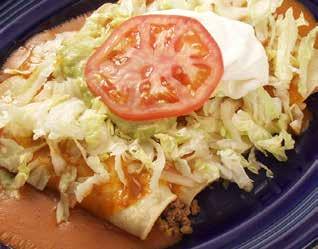 Especialidades Montezuma : Montezuma Specialties : Burritos Fajita Burrito 11.85 Chicken or steak with peppers, onions and tomatoes topped with cheese sauce and served with rice. Burrito Deluxe 10.