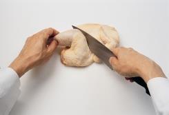 Spread the chicken open and spread through the bones on