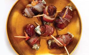 BACON-WRAPPED DATES 3 simple ingredients come together to make these succulent crowd-pleasing bites. Makes 24 pieces 24 pitted dates or dried figs 4 oz.
