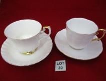 sugar bowl, 5 cups and saucers (the cups have a gold interior) back