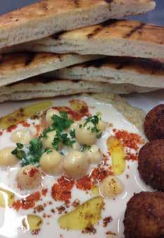 Mediterranean Platter Hummus, falafel & Tahini dips with grilled pita bread, marinated olives, pickles & Greek feta cheese.