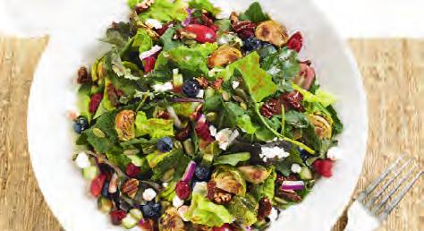 KALE AND ROASTED BRUSSELS SPROUTS SALAD THE SUPER SALAD KALE AND ROASTED BRUSSELS SPROUTS SALAD Baby kale herb-roasted brussels sprouts romaine fresh blueberries sweet red grapes dried cranberries