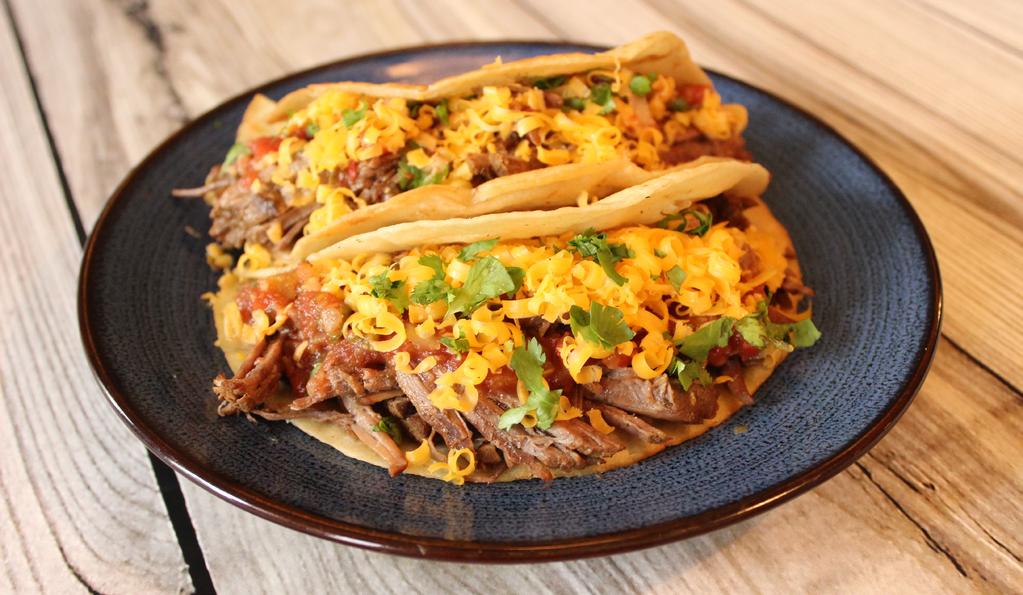 Pressure Cooker Spicy Beef Carnitas Preheat pressure cooker on browning setting and add oil, salt, cumin, paprika, chile powder and chipotle sauce; when mixture is hot, add cubed beef; brown beef in
