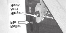 Pull the door hinge locks on both left and right door hinges down from the oven frame completely towards the oven door (See Figure 2). A tool such as a small flat-blade screwdriver may be required. 3.
