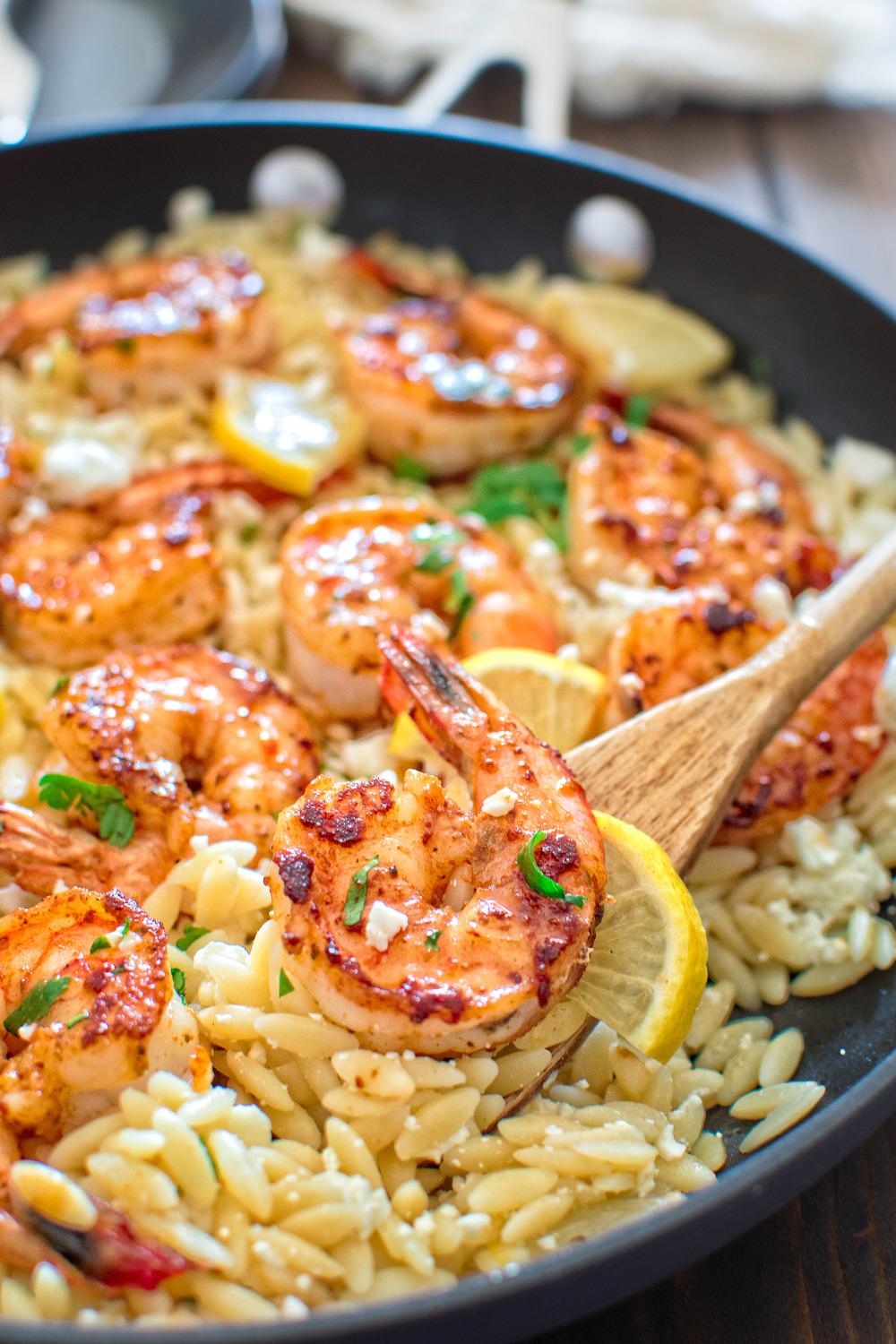 ORZO WITH SHRIMP AND FETA Cook Time - 15 mins Total Time - 25 mins 1 cup uncooked orzo pasta 12 jumbo shrimps, peeled and deveined 1 tsp Old Bay Seasoning 2 tbsp butter 1/2 cup good quality feta