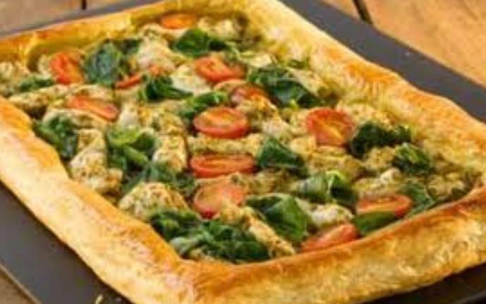 Puff Pastry Tart Ingredients: 1 ready made puff pastry sheet 1 egg or a little milk for a glaze 4-5 tbsp pesto 300g Cooked chicken cut into strips 8-10 cherry tomatoes 50g spinach 3 spring onions 30