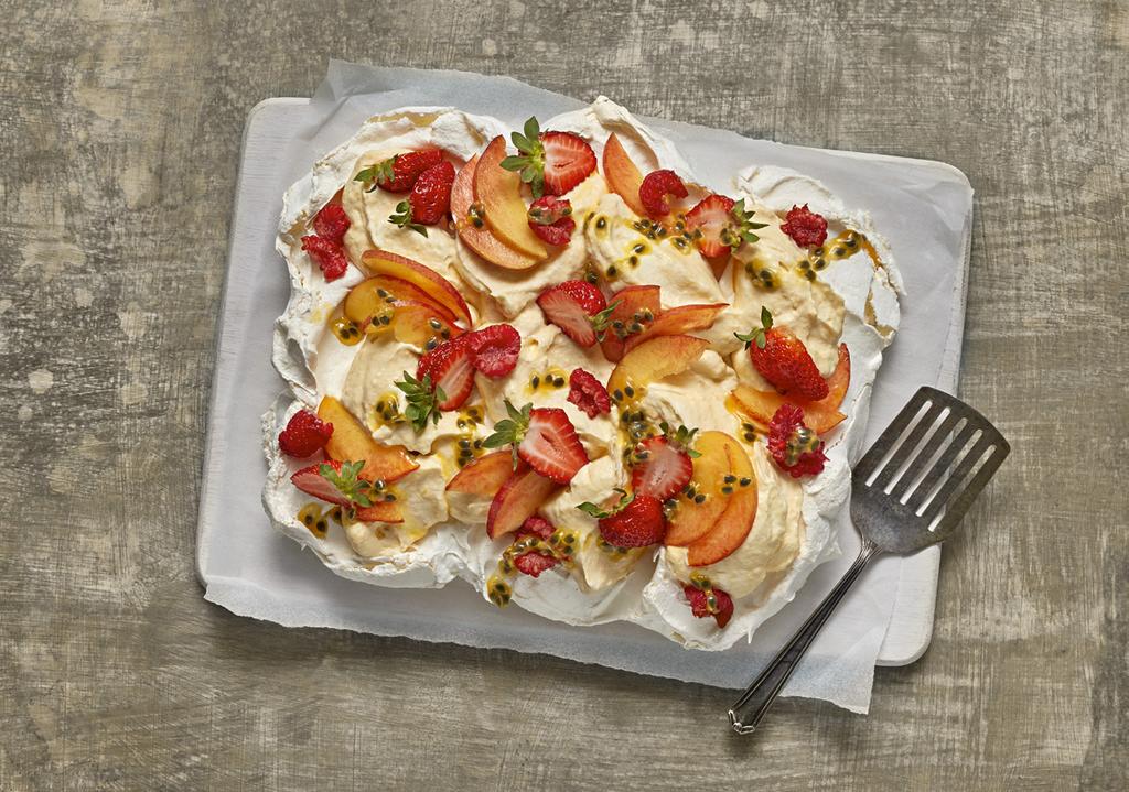 SUMMER PAVLOVA SERVES: 10 PREP: 25 MINS COOK: 1 HR 30 MINS (PLUS COOLING) Pavlova is a classic Aussie dessert loved by the whole family.