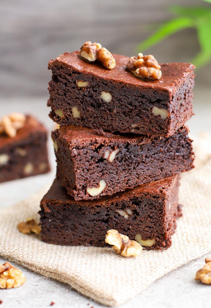 CHOCOLATE DECADENCE Walnut Brownies PREP: 20 minutes COOK: 40 minutes MAKES: 16 120g good quality 70% dark chocolate, roughly chopped 90g (¾ cup) plain flour 100g (1 cup) LUCKY ALMOND MEAL 40g (½