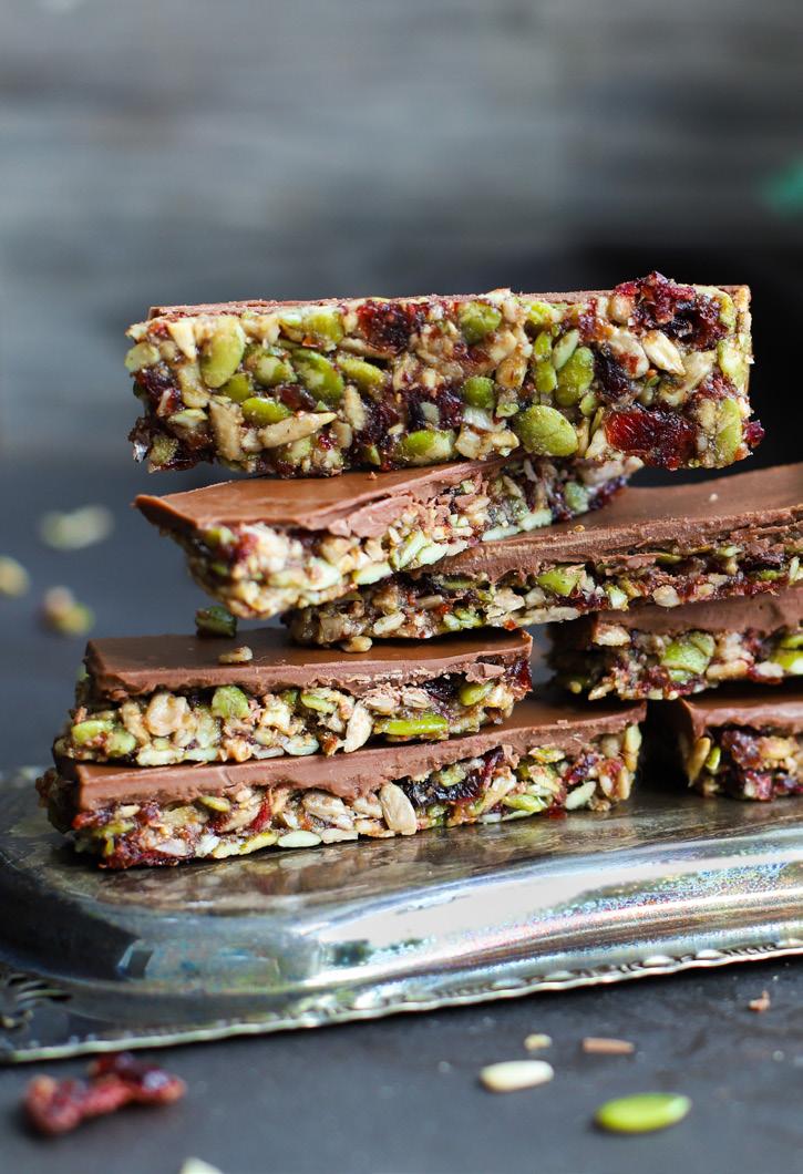 HEALTHIER OPTIONS Chocolate and Cranberry Seed Bars PREP: 6½ hours (including chill) COOK: 5 minutes MAKES: 8 125g (1 cup) dried cranberries 200g (1½ cups) LUCKY NATURAL SEED MIX WITH PINE NUTS 10g