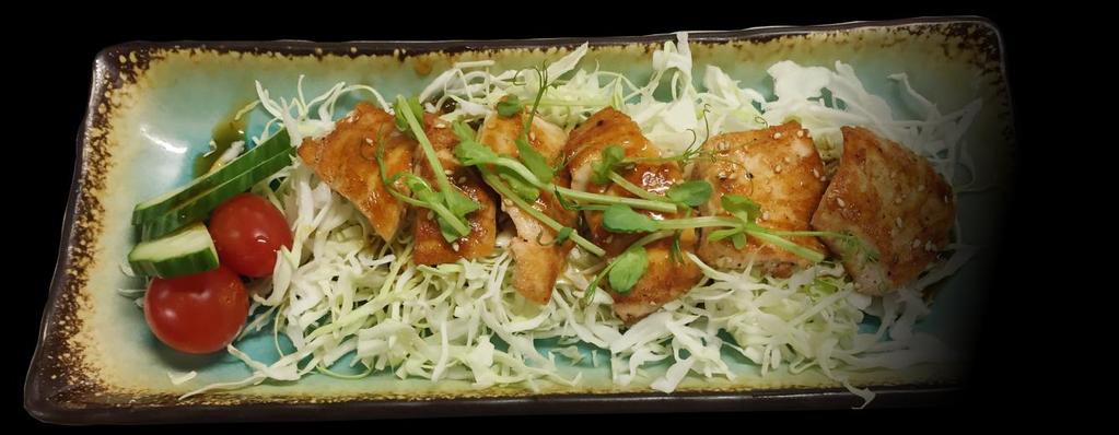 80 Japanese style lightly battered fried fish in our special 73 SALMON TERIYAKI