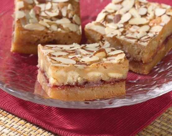 teaspoon almond extract 1 cup all-purpose flour 2/3 cup cherry preserves 1/2 cup flaked coconut 1/2 cup sliced almonds MELT butter in a small saucepan over low heat, stirring just until melted.