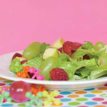 Ingredients: + + 3 heads of lettuce, washed and cut into bite-sized pieces + + 2 cups raspberries + + 3 cups seedless grapes + + 4 apples, cut into cubes + + 1 lemon, cut in half + + bowl + +
